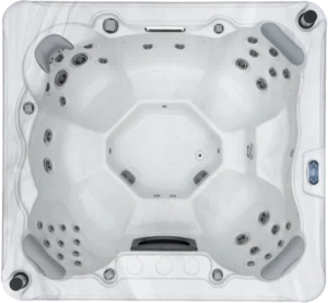 Overhead view of an Aquatic Spas Rainier A2P-740B 7 foot hot tub with open bench seating, 40 jets, LED lighting and Bluetooth speakers, delivering Minnesota hot tub fun year-round
