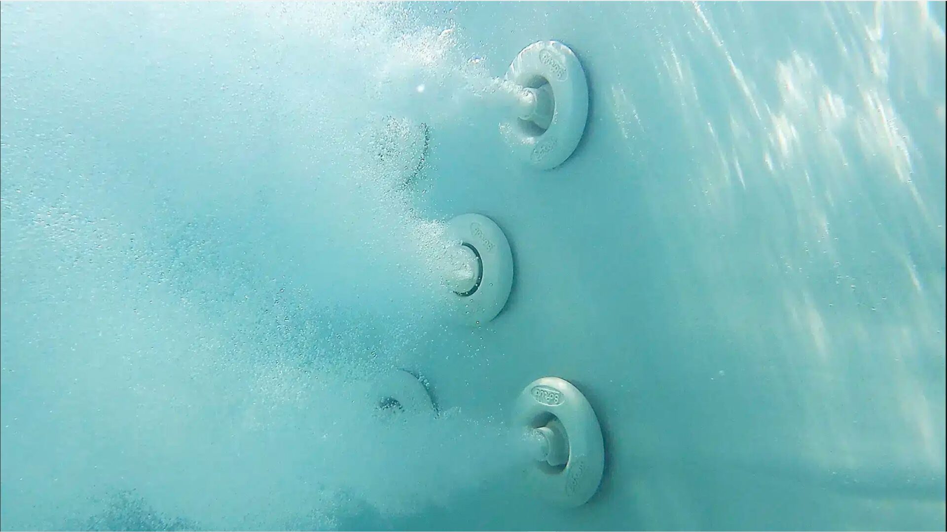 Close up picture of Softub PosidanX jets under water